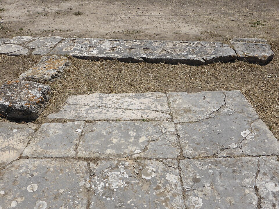 The Erastus inscription cut into a stone pavement at Corinth