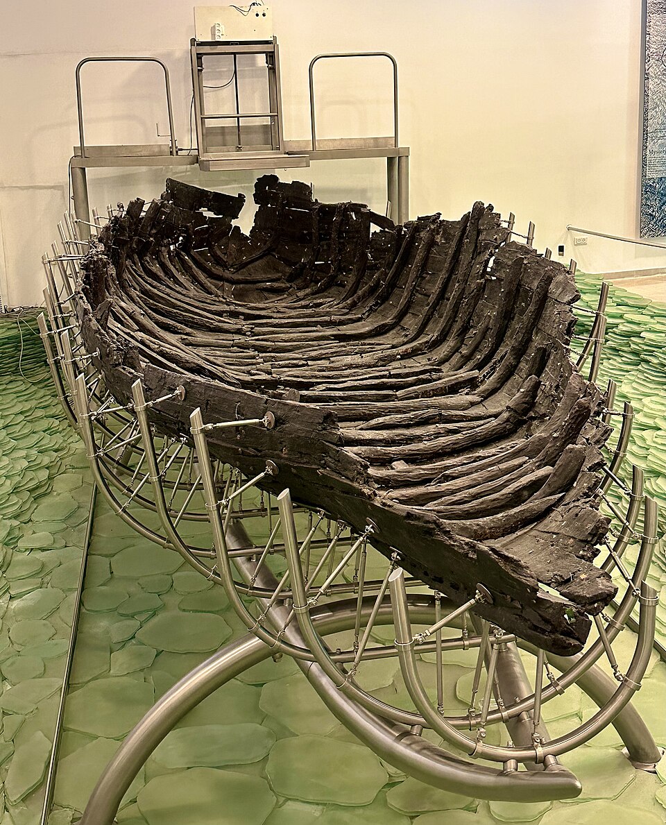 The conserved ancient Galilee boat displayed at Ginosar
