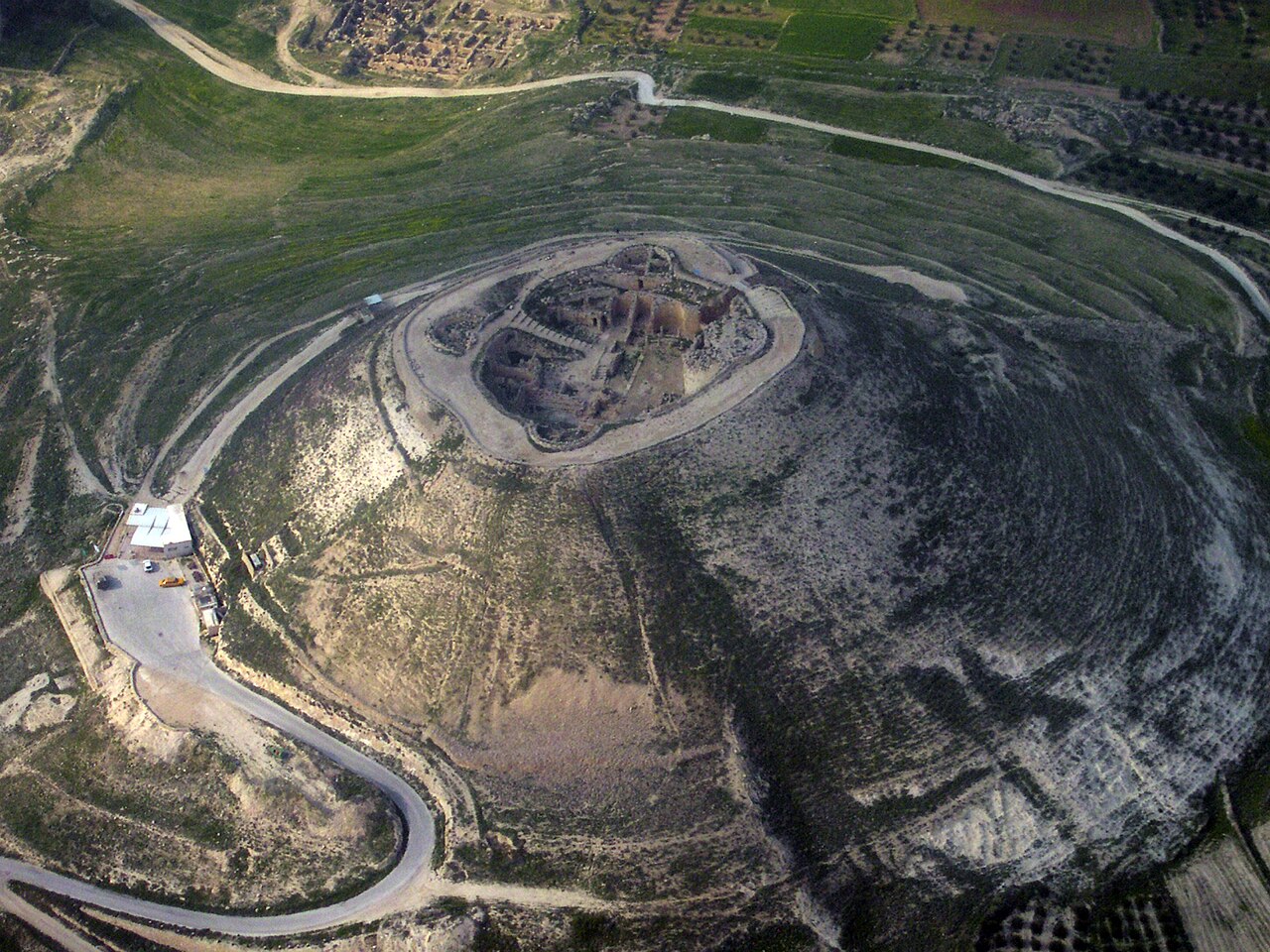 The cone-shaped fortress-palace of Herodium rising from the desert