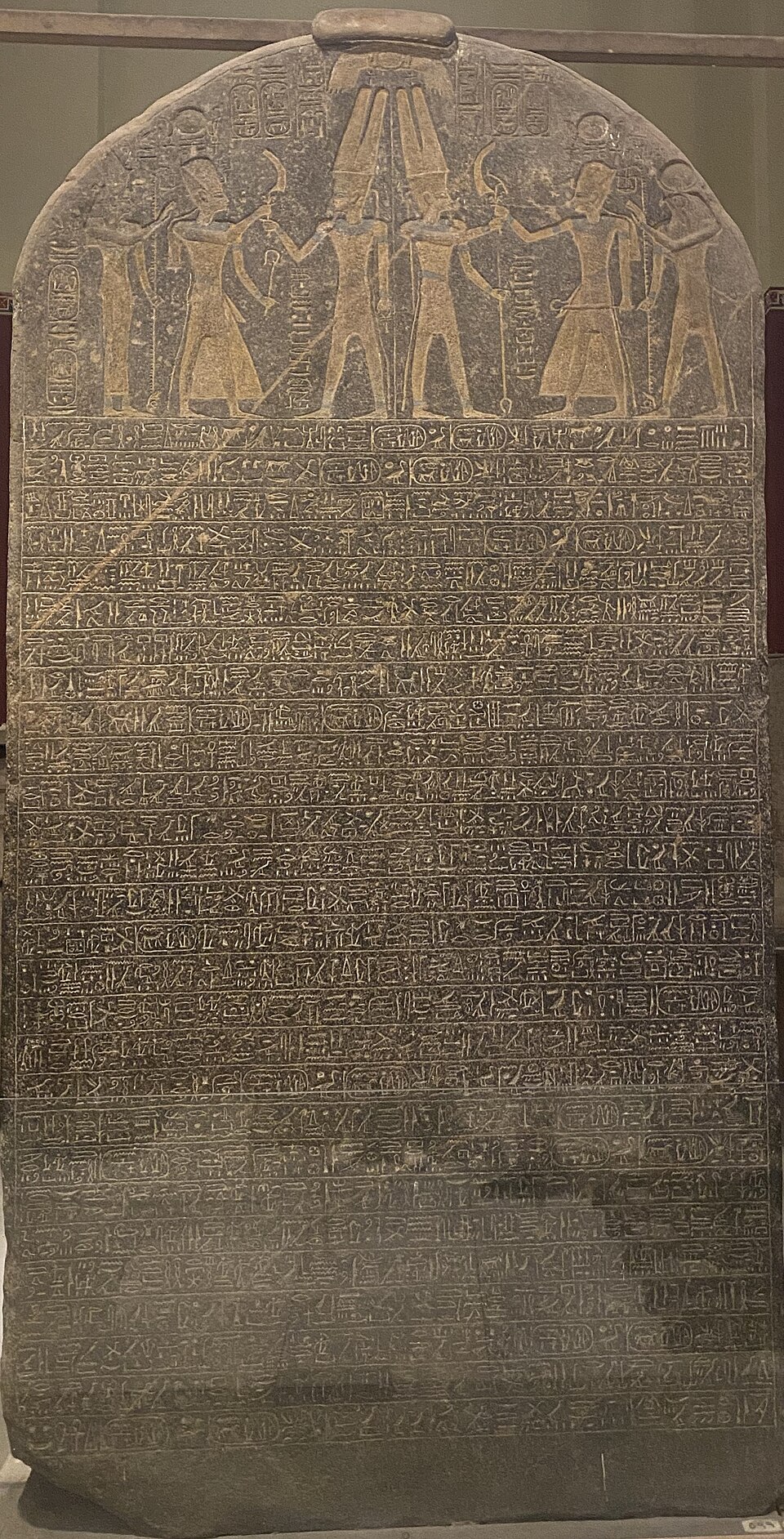 The Merneptah Stele, a tall granite slab covered in hieroglyphic text