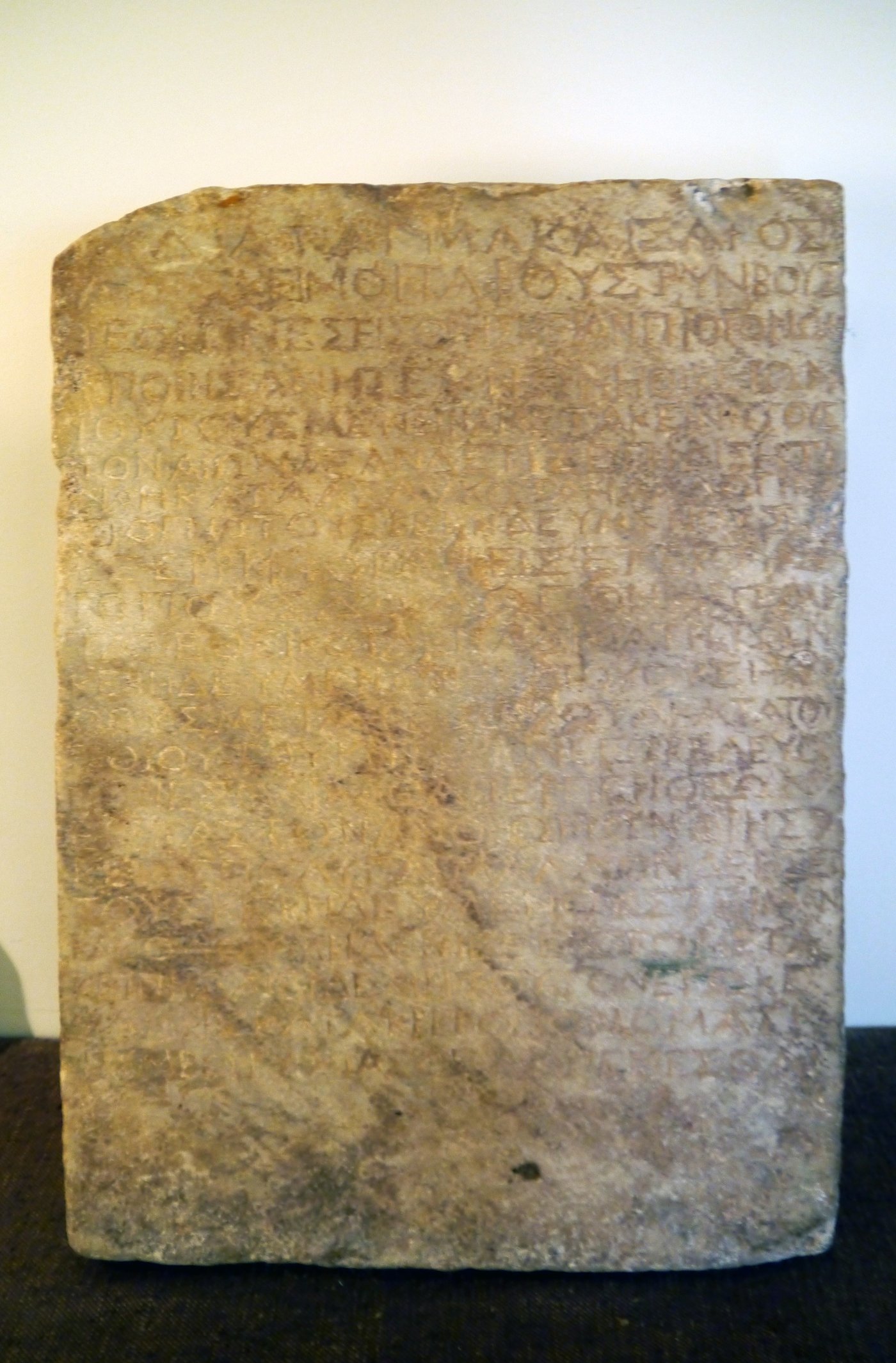 The Nazareth Inscription, a Greek marble edict against grave robbing, displayed at the Cabinet des Médailles, Paris