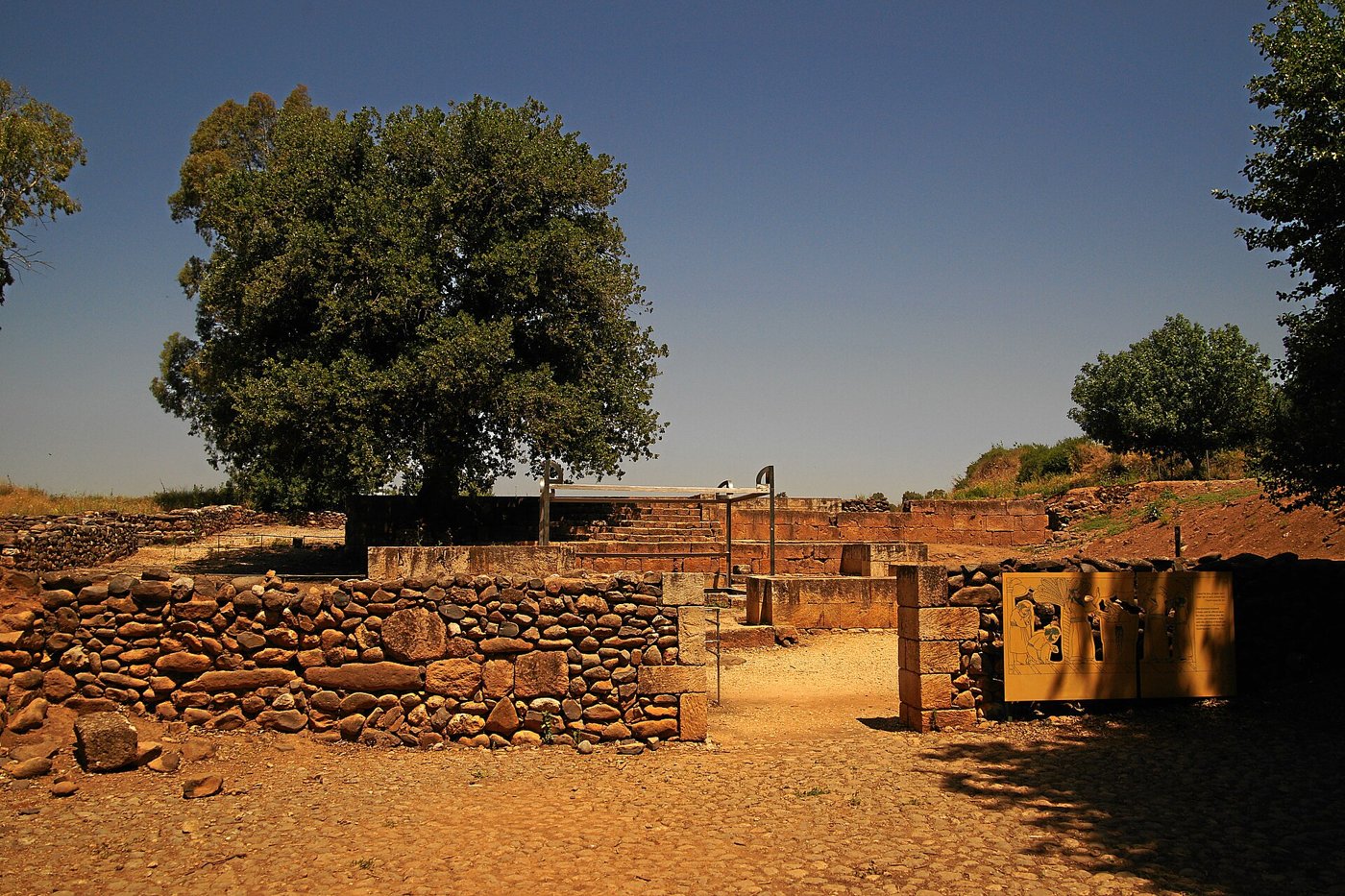 The stepped stone platform of the Iron Age sacred precinct at Tel Dan, with a modern metal frame outlining the altar area